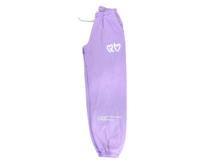 At The Fortt Urban Boutique, We carry the Streetwear Clothing Line: HOUSE OF FREQUINCY This HOUSE OF FREQUINCY Apparel piece is a jogger pant in pigment dyed lilac  with puff printed details on a heavy fleece fabric with elastic ankle and adjustable drawstring. 