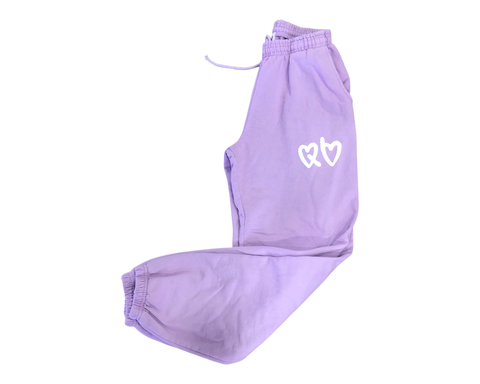 At The Fortt Urban Boutique, We carry the Streetwear Clothing Line: HOUSE OF FREQUINCY This HOUSE OF FREQUINCY Apparel piece is a jogger pant in pigment dyed lilac  with puff printed details on a heavy fleece fabric with elastic ankle and adjustable drawstring. 